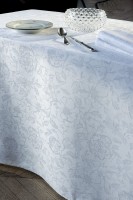 Tovaglia de Garnier-Thiebaut; Modelo Mille Charmes Blanc; Colore principale bianco en cotone; Taglia Ø 180 cm rotondo; Motivo Occasioni festive in tessuto jacquard