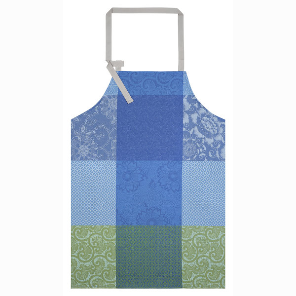 Apron from Le Jacquard Français; Model Fleurs De Kyoto Indigo; main colour blue in cotton; Size 90x96 cm ; Motif graphic patterns; Pattern jacquard woven