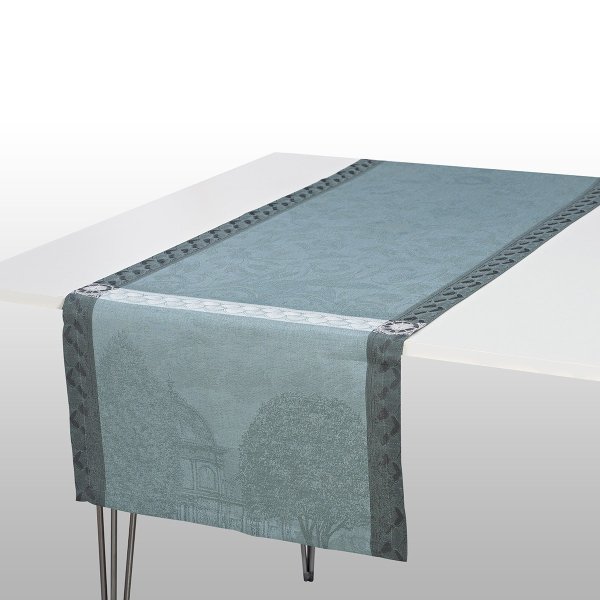 Runner da tavola de Le Jacquard Français; Modelo Symphonie Baroque Fumee; Colore principale blu en lino; Taglia 50x150 cm rettangolare; Motivo Luoghi e città in tessuto jacquard