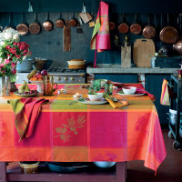 Coated tablecloth from Garnier-Thiebaut; Model Mille Tutti Frutti Sangria; main colour multicolored in cotton; Size Ø 175 cm round; Motif Fruit and vegetable, Summer; Pattern jacquard woven