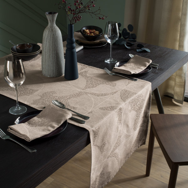 Table runner from Garnier-Thiebaut; Model Mille Gouttes Taupe; main colour brown in cotton; Size 55x155 cm rectangular; Motif ; Pattern jacquard woven