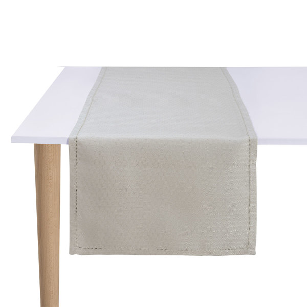 Chemin de table de Le Jacquard Français; Model Portofino Geo Sabbia; Couleur principale beige en lin; Taille 50x150 cm rectangulaire; Motif  Tissé