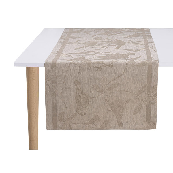 Chemin de table de Le Jacquard Français; Model Voliere Solaire; Couleur principale beige en lin; Taille 50x150 cm rectangulaire; Motif Animaux tissé jacquard