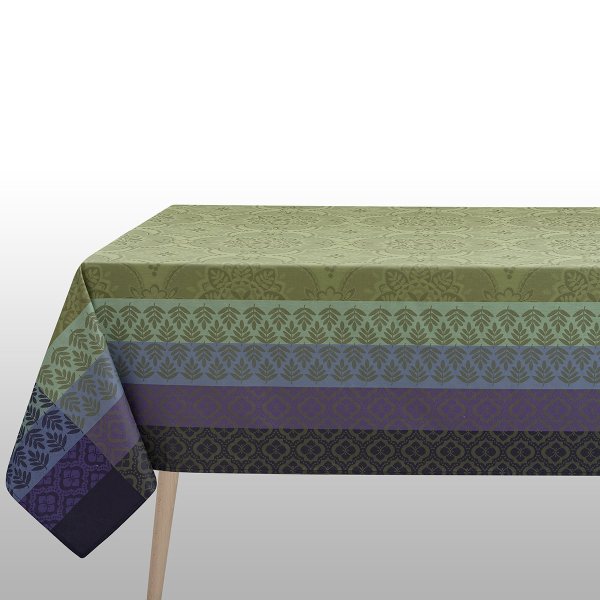 Coated tablecloth from Le Jacquard Français; Model Bastide Olive; main colour green in cotton; Size 150x220 cm rectangular; Motif graphic patterns; Pattern jacquard woven
