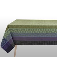 Coated tablecloth from Le Jacquard Français; Model Bastide Olive; main colour green in cotton; Size 175x175 cm Square; Motif graphic patterns; Pattern jacquard woven