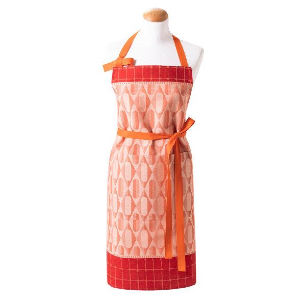 Apron from Le Jacquard Français; Model Pâtisseries Francaises Framboise; main colour pink in cotton; Size 80x96 cm ; Motif graphic patterns; Pattern jacquard woven