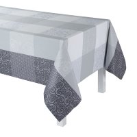 Coated tablecloth from Le Jacquard Français; Model Fleurs De Kyoto Brume; main colour grey in cotton; Size 150x150 cm Square; Motif graphic patterns; Pattern jacquard woven