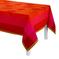 Tablecloth from Le Jacquard Français; Model Parfums De Bagatelle Capucine; main colour orange in cotton; Size 175x175 cm Square; Motif Flowers and plants, Summer; Pattern jacquard woven