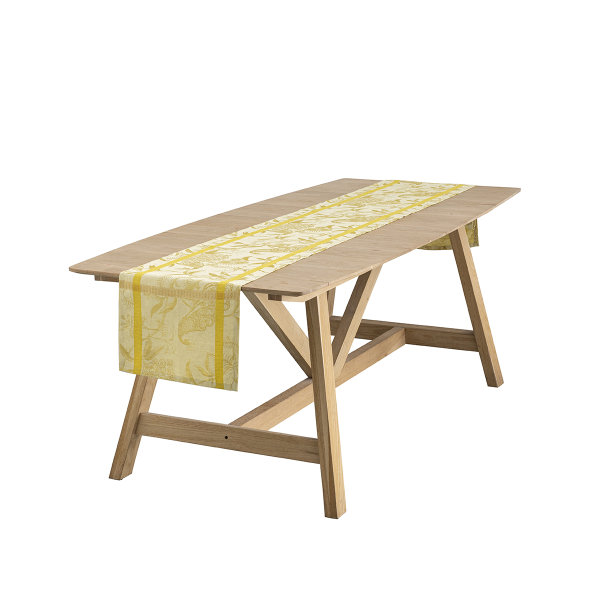 Camino de mesa de Le Jacquard Français; Modelo À LOrangerie Mimosa; Color principal amarillo en lino; Tamaño 50x150 cm rectangular; Motivo Verano, Animales en tejido jacquard