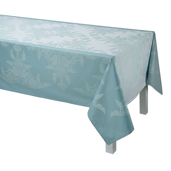 Coated tablecloth from Le Jacquard Français; Model Syracuse Aqua; main colour blue in cotton; Size 150x220 cm rectangular; Motif Spring, Summer; Pattern jacquard woven
