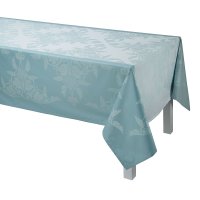 Coated tablecloth from Le Jacquard Français; Model Syracuse Aqua; main colour blue in cotton; Size 175x250 cm rectangular; Motif Spring, Summer; Pattern jacquard woven