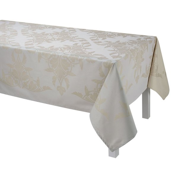 Coated tablecloth from Le Jacquard Français; Model Syracuse Dolce; main colour beige in cotton; Size Ø 175 cm round; Motif Spring, Summer; Pattern jacquard woven